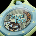 étail lunette Royal Pop Blaue Acht — huit vis hexagonales vert lime, inscription Royal Pop, fond saphir décoré Pop Art